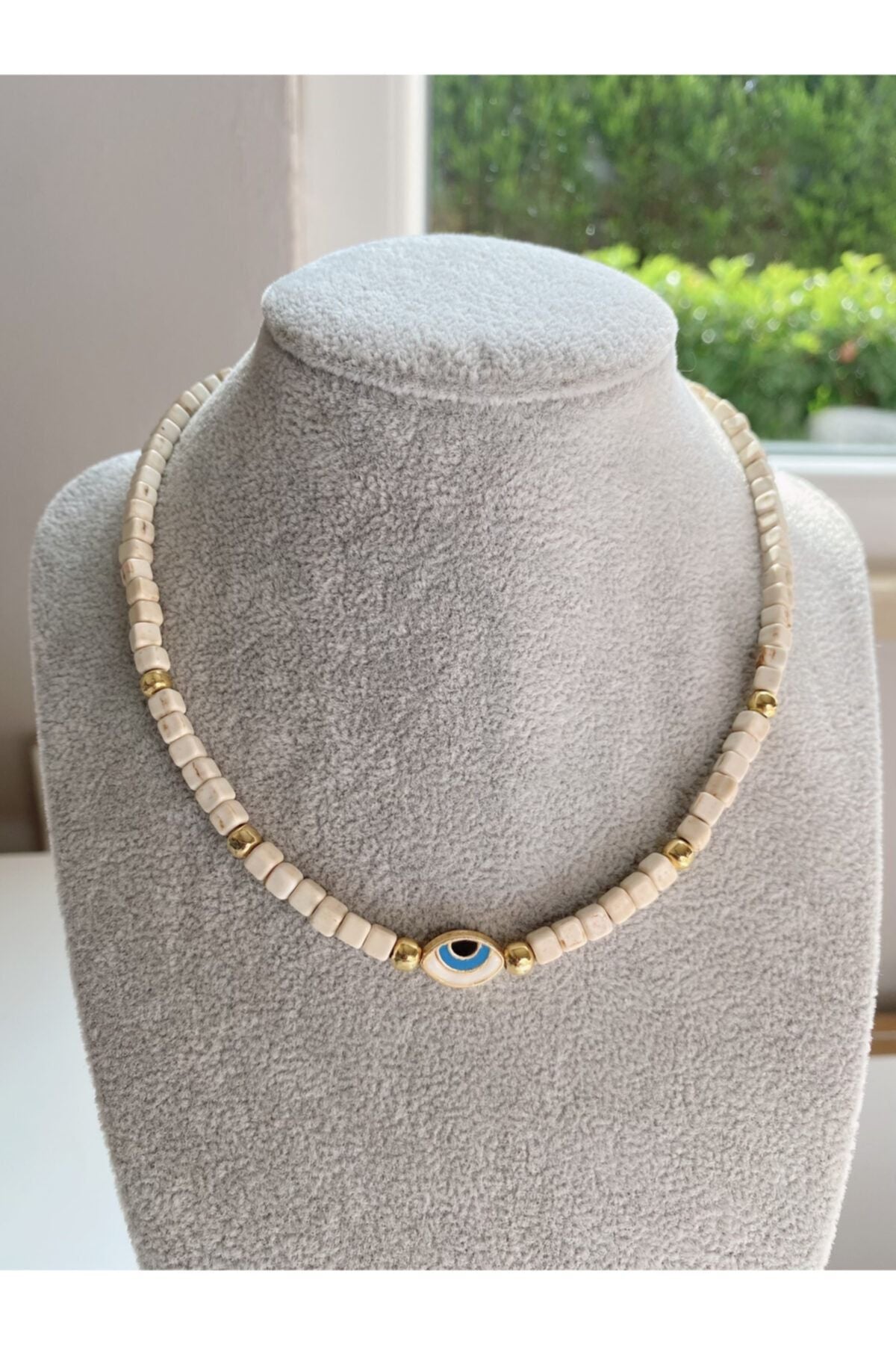 Κολιέ με μάτι και λευκό κοράλι