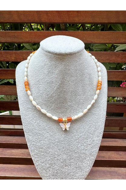 Butterfly necklace with healing gemstone collection