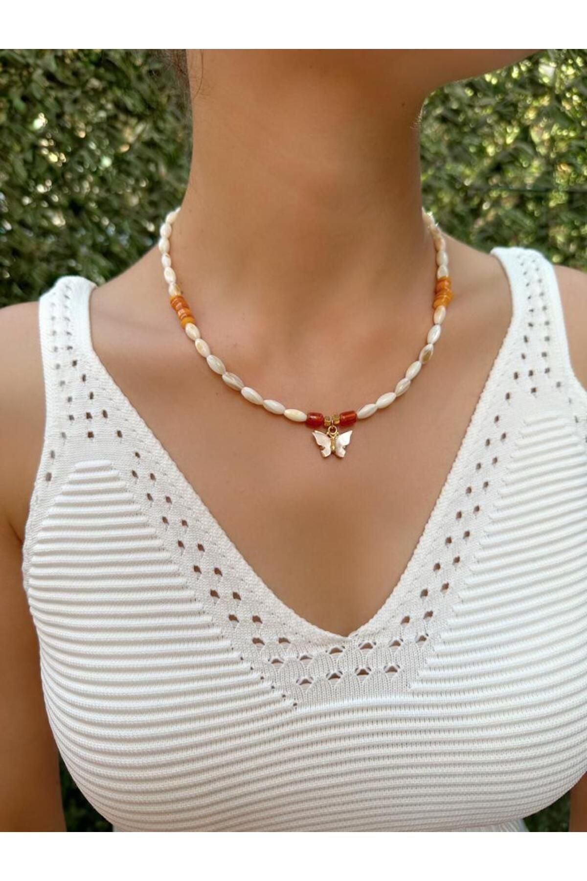Butterfly necklace with healing gemstone collection