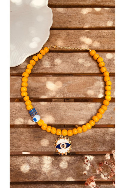 Small round yellow glass pendant