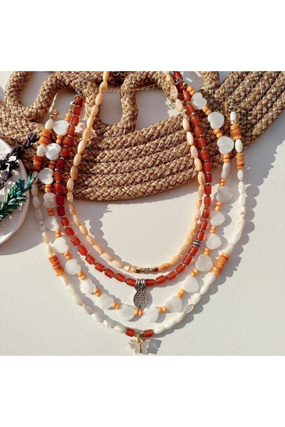 Butterfly necklace with healing gemstone collection