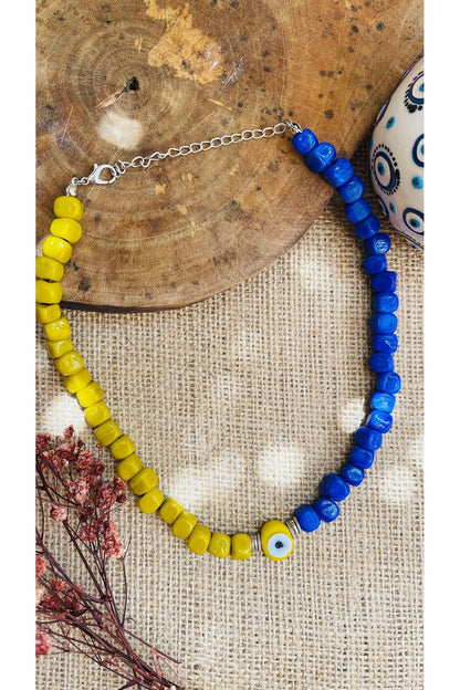 Sapphire blue and yellow evil eye necklace