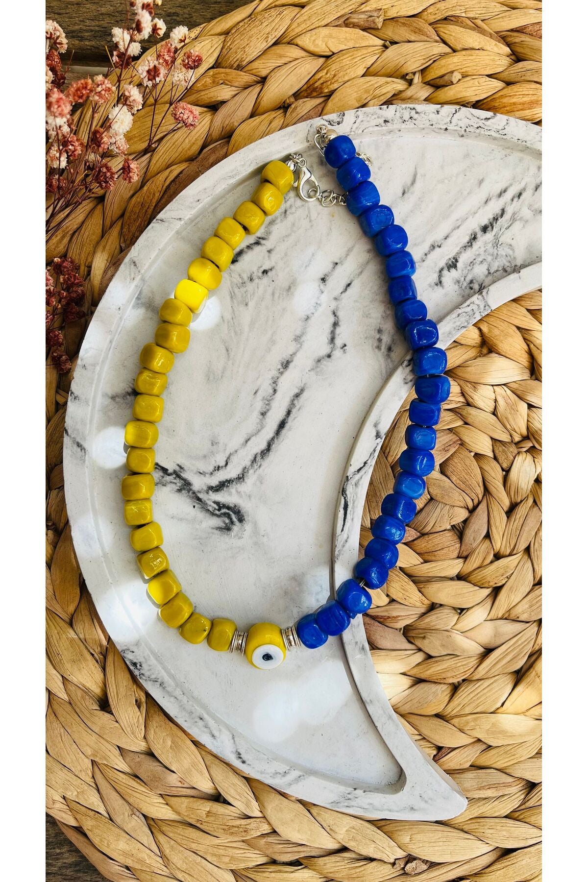 Sapphire blue and yellow evil eye necklace
